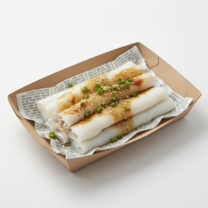 Cheung fun in open tray with newsprint paper