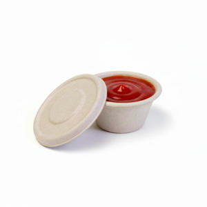Round container with ketchup and lid